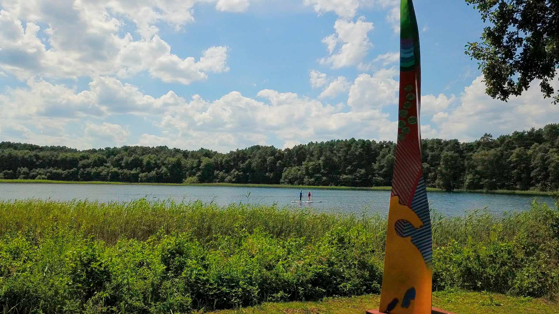 View of the sculpture trail and lake at Skulpturenpark Wesenberg